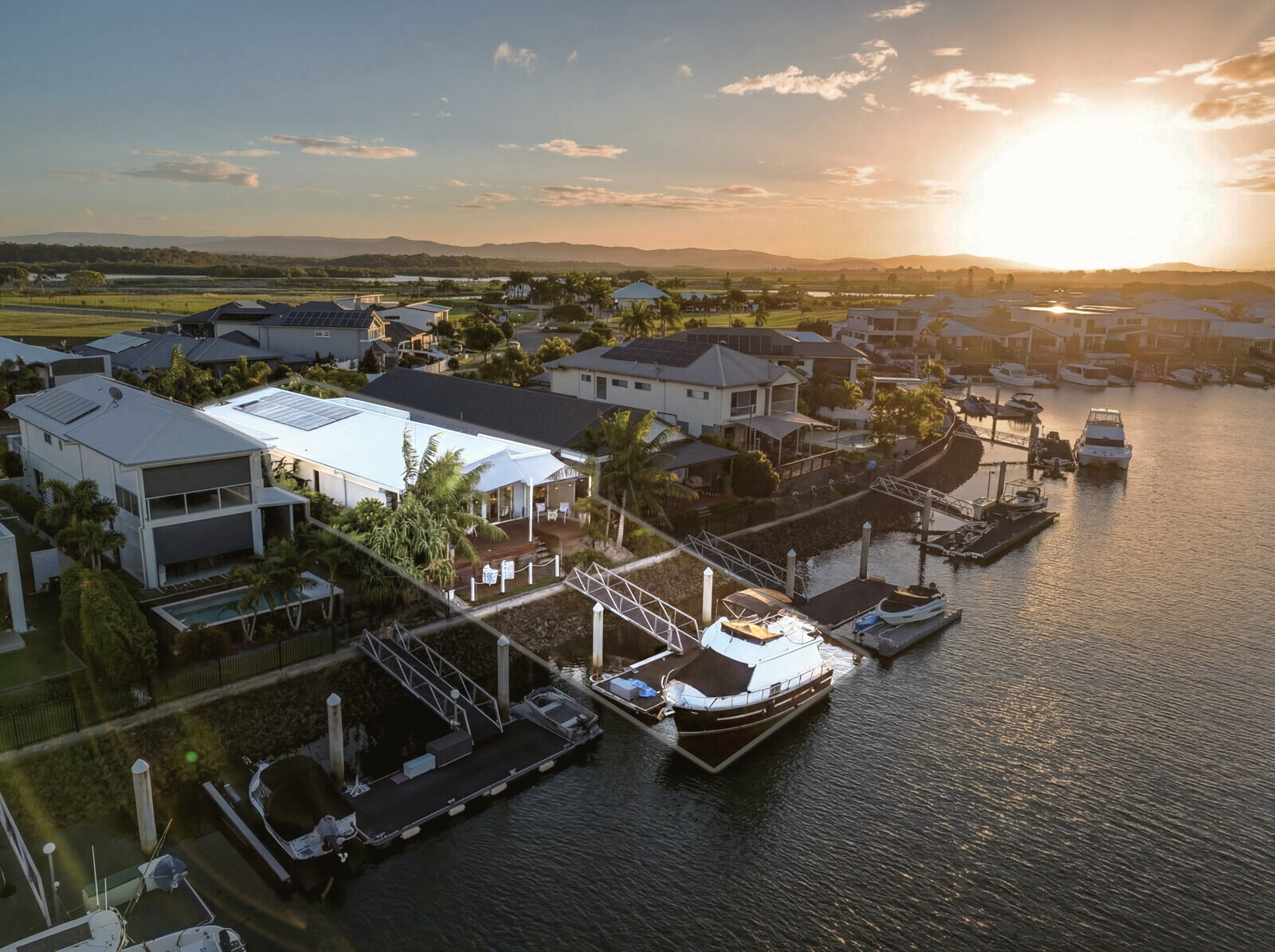 Waterfront residence at sunset